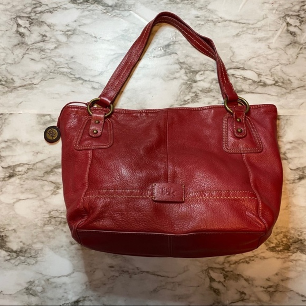 The sak red leather shoulder bag